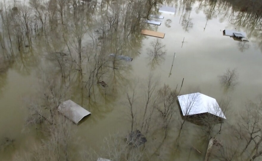 Buildings were underwater on Saturday in Savannah, Tenn., after days of heavy rain in the area.