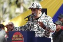 Venezuela's President Nicolas Maduro speaks during a rally marking the 22nd anniversary of the late President Hugo Chavez's return to power after a failed coup attempt, in Caracas, Venezuela, Saturday, April 13, 2024.
