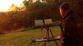 Painter Justin Vining works at his portable studio at Brown County State Park.