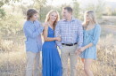 Tiffany Storrs (middle) with her family. Storrs is bilaterally deaf and has two cochlear implants.