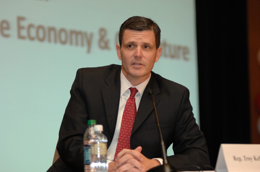 In this 2012 file photo, Troy Kelley, the Democratic candidate for state auditor at the time, takes questions at a debate.