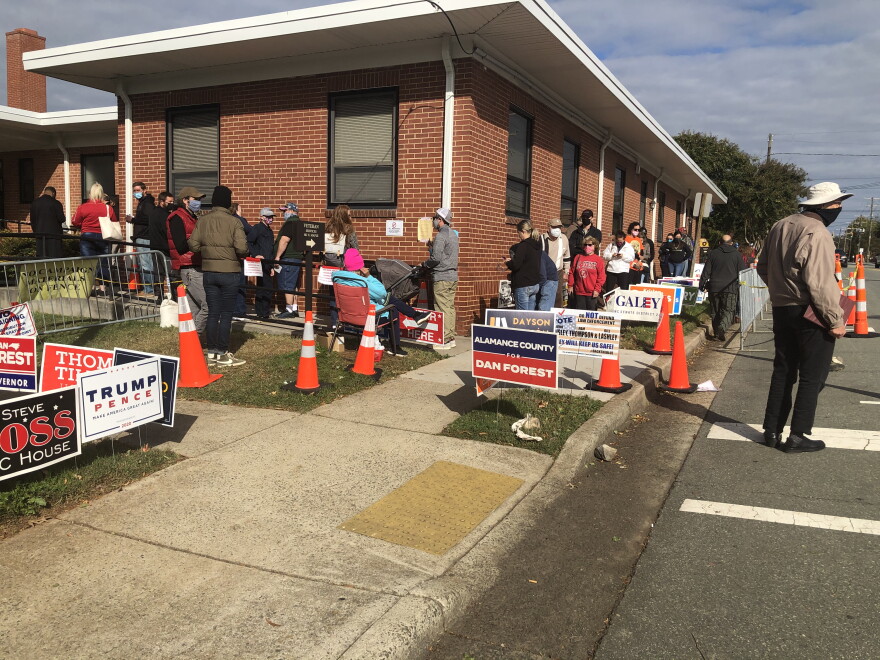 Voters line up at the Alamance County Annex Building, a polling site in Graham, NC. Saturday was the final day of North Carolina's early voting period.