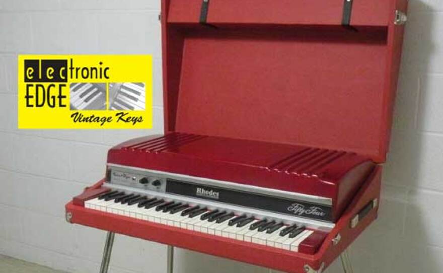 A custom Rhodes Stage 54 decked out in candy apple red metal flake.