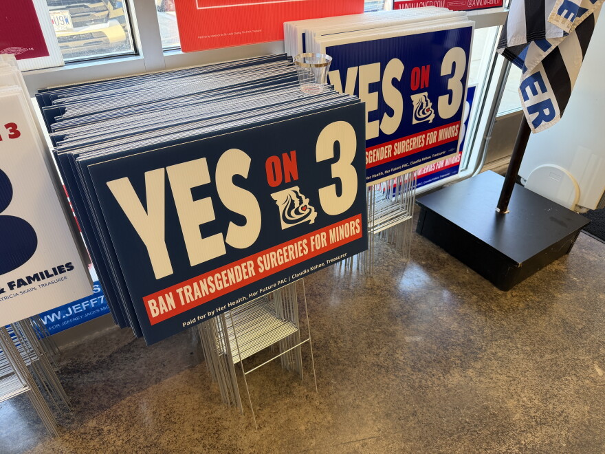 Signs for Amendment 3 emphasize the proposal's ban on gender-affirming care, namely gender-affirming surgery.