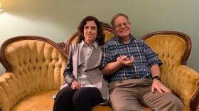 Photo by Gina Gambony/WHRO. Deborah (left) and Stewart Prost live in Norfolk's Ghent neighborhood. Part of the appeal of this neighborhood for the couple is its walkability.