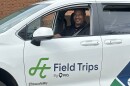 Image, man driving a vehicle labeled Field Trips