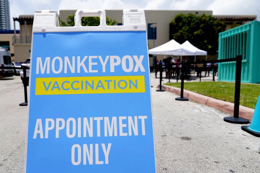 A sign for monkeypox vaccinations is shown at a vaccination site, Wednesday, Aug. 10, 2022, in Miami Beach.