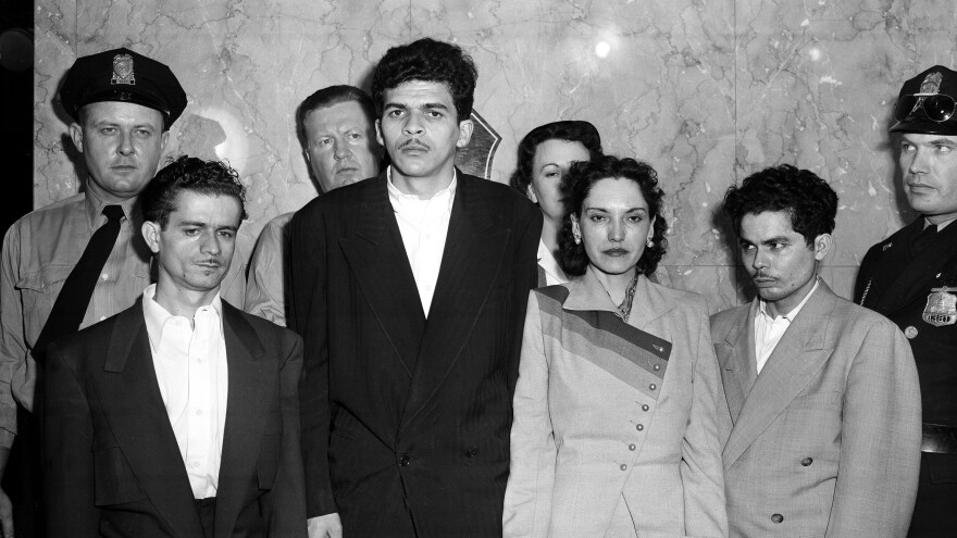 Puerto Rican nationalists Irvin Flores Rodriguez, Rafael Cancel Miranda, Lolita Lebron, and Andres Figueroa Cordero, standing in a police lineup following their arrest after a shooting attack on the U.S. Capitol on March 1, 1954.