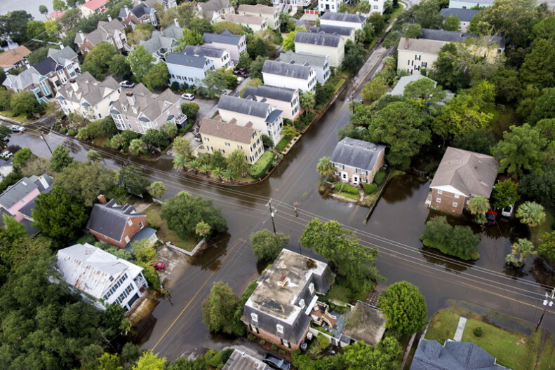 FILE - An aerial view taken from a Coast Guard helicopter showing the continuing effects of flooding caused by Hurricane Joaquin in areas surrounding Charleston, S.C., Oct. 5, 2015.
