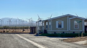 The Santiago Desert Estates sits at the edge of Mojave, a short distance from wind turbines and Joshua trees. It's one of the last affordable rental markets in California, which is one big reason the mobile home park has become a community for Afghan refugees in the state.