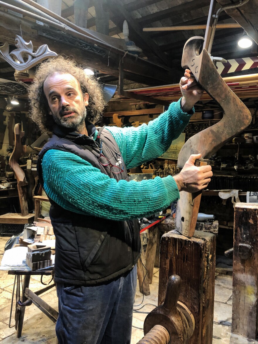 Master artisan Paolo Brandolisio, one of only four remaining makers of oars and oar posts for the city's legendary gondolas, is trying to put his workshop back in order after the floods.