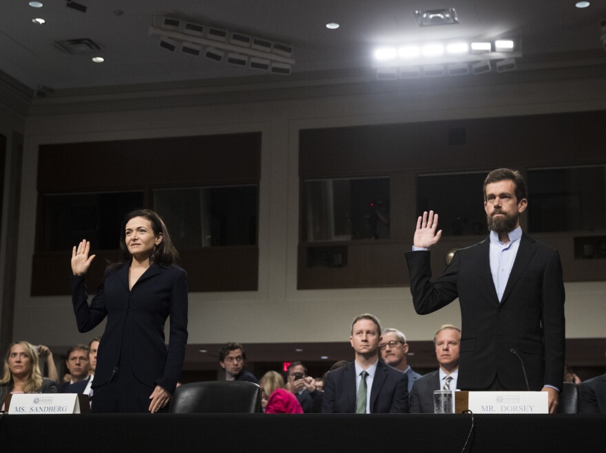 Facebook Chief Operating Officer Sheryl Sandberg and Twitter Chief Executive Officer Jack Dorsey testify during a Senate intelligence committee hearing on Sept. 5.