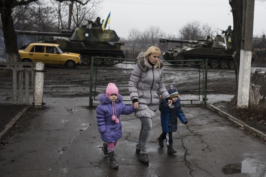 Heavy weaponry is moved through eastern Ukraine, disrupting day-to-day life.