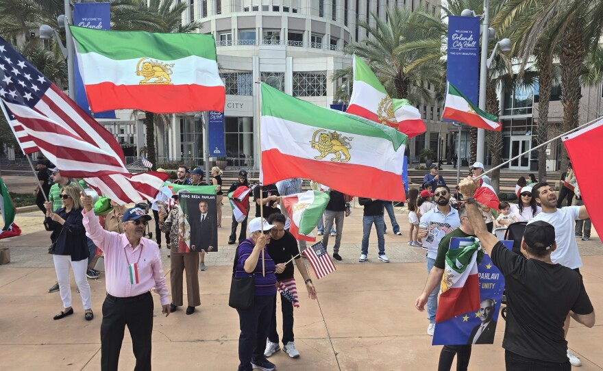 Central Florida's Iranian community gathered in front of Orlando City Hall to celebrate the death of Ayatollah Khamenei on Sunday March 1, 2026.