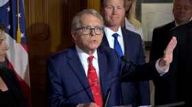 Gov. Mike DeWine gestures during the press conference on July 1, 2021, after he signed the state budget hours before.