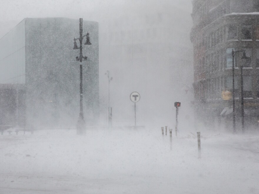 White-out conditions are seen at Government Center Station in Boston as winter storm weather brings blizzard conditions with high winds. More than 100,000 are without power in Massachusetts as of Saturday afternoon.