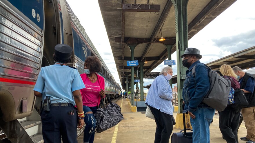  Amtrak riders depart the Crescent line at the Birmingham, Alabama station on April 9, 2022. 