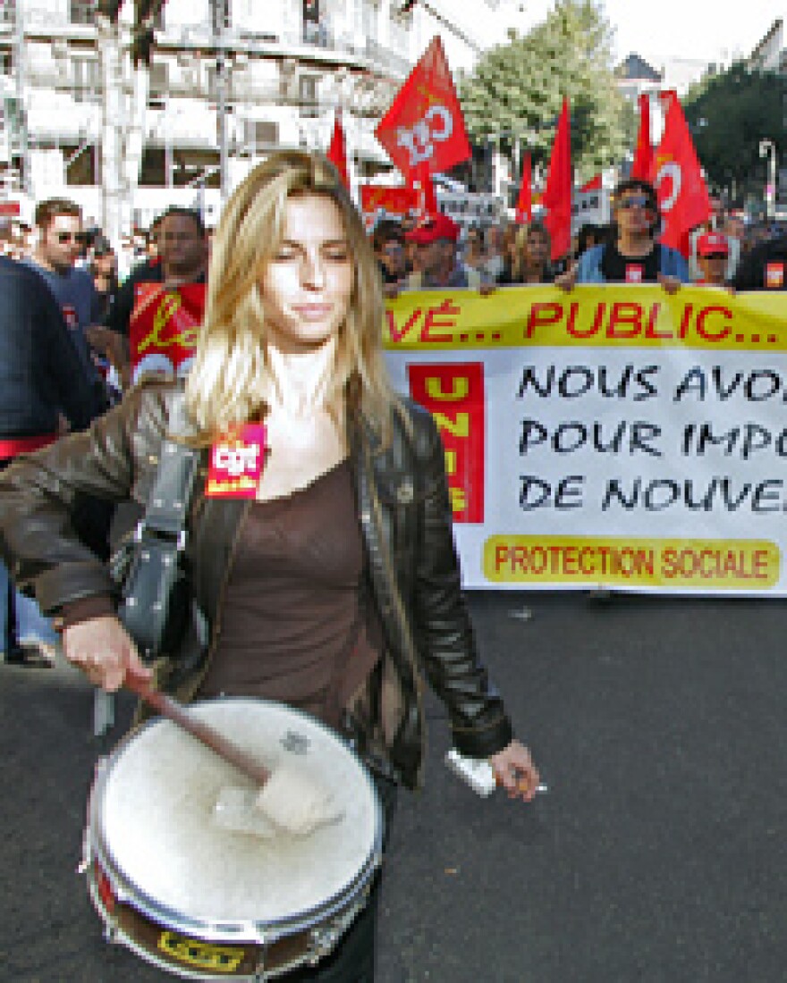 French public workers demonstrate in Marseilles, during a 24-hour strike against the government's reform plans of historic pensions privileges.