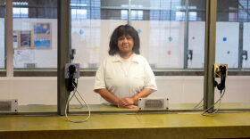  Melissa Lucio stands in the visitation area of a Texas federal prison.
