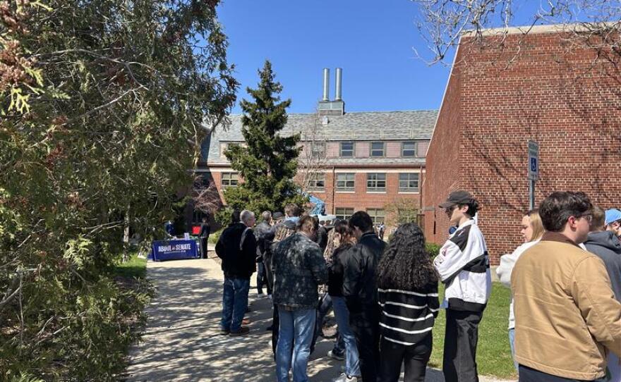 Students lining up outside Anthony Hall on MSU's campus