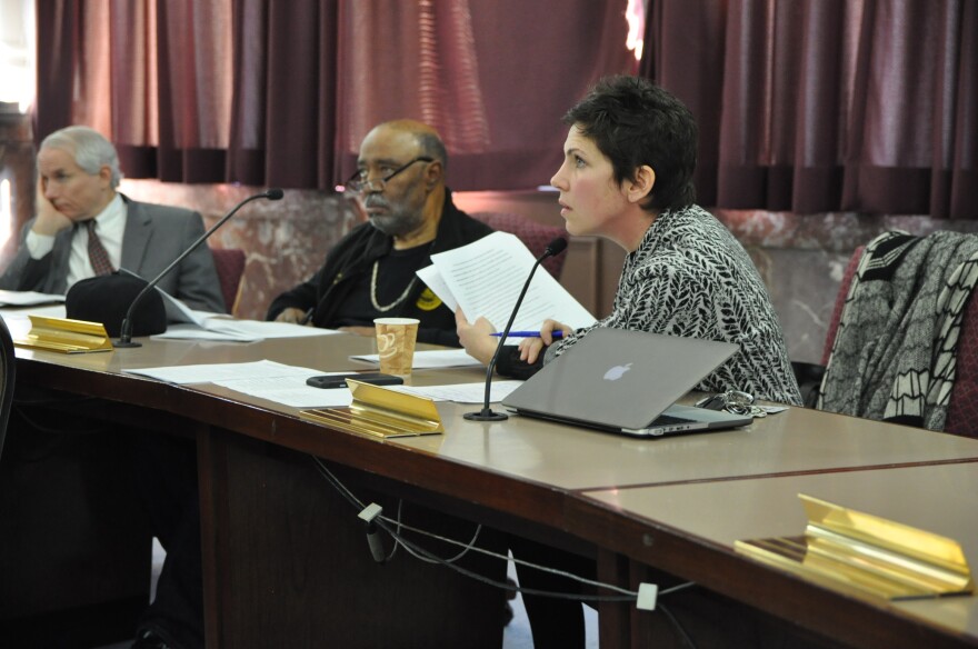 Bill cosponsor Alderwoman Cara Spencer asks Tom Buckley, general counsel for the Archdioscese of St. Louis, to clarify his position.  