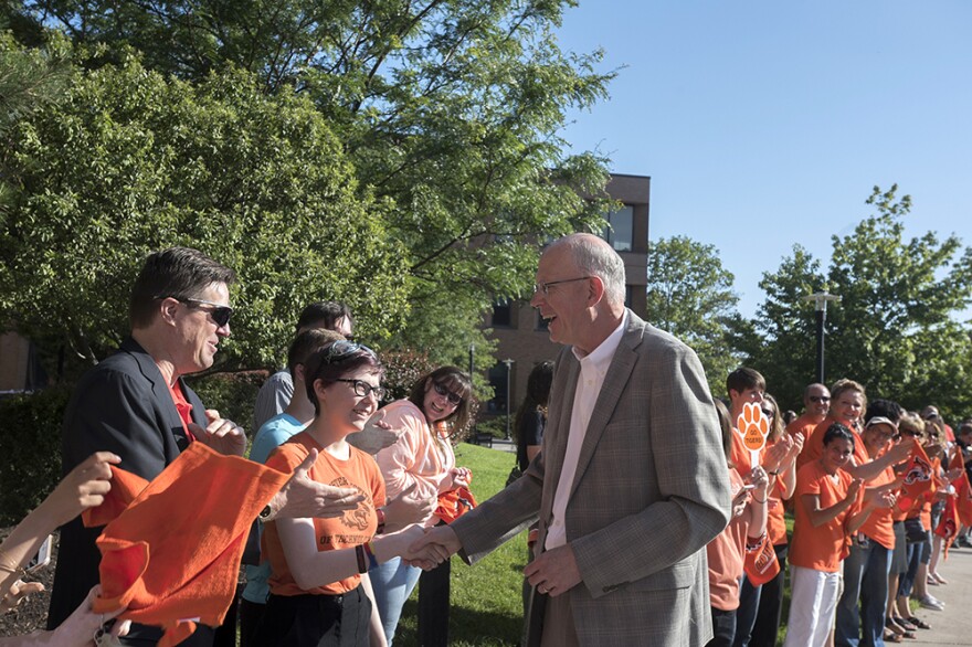 A welcome line greets new RIT president David Munson