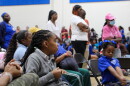 Parents wait to ask questions about Fannie C. Williams's future at a meeting on Oct. 15, 2026.