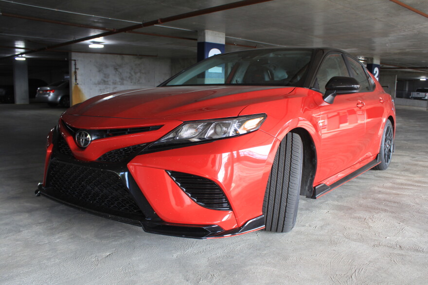 A red TRD Camry.