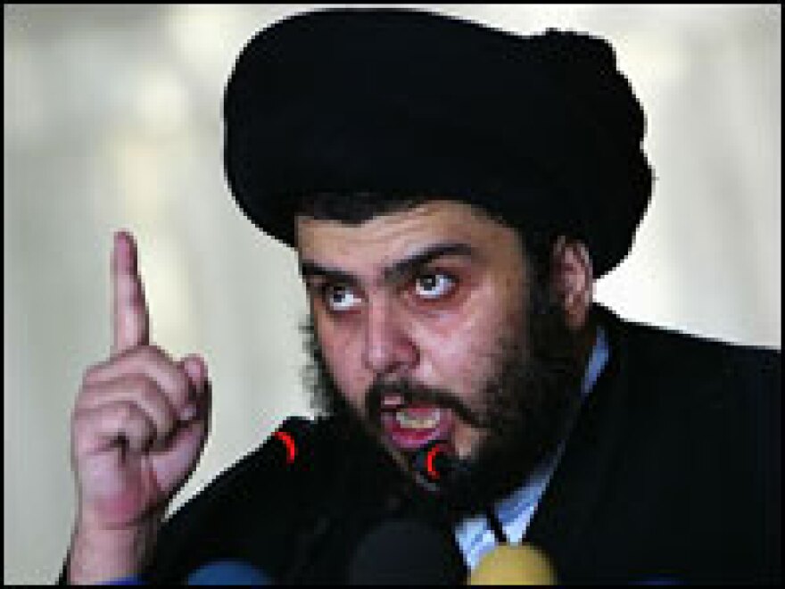 Iraqi radical Shiite cleric Moqtada al-Sadr speaks to his followers in November 2006 in Kufa.