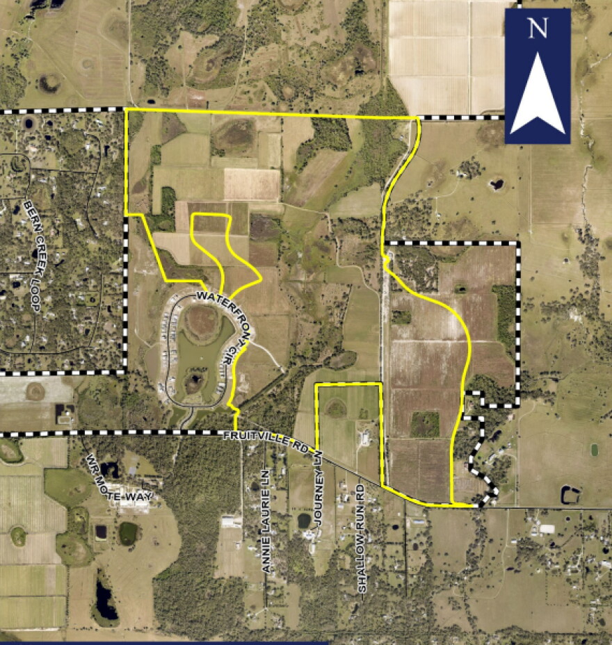 A map of land in northern Sarasota County with a yellow line showing where the Lakewood Ranch will be built. 
