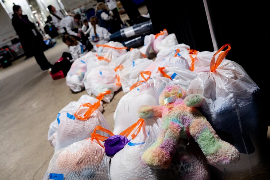 Hundreds of fan-thrown stuffed animals are packed into trash bags following the women’s short program during the 2026 U.S. Figure Skating Championships at the Enterprise Center on Wednesday, Jan. 7, 2026, in St. Louis’ Downtown West neighborhood.