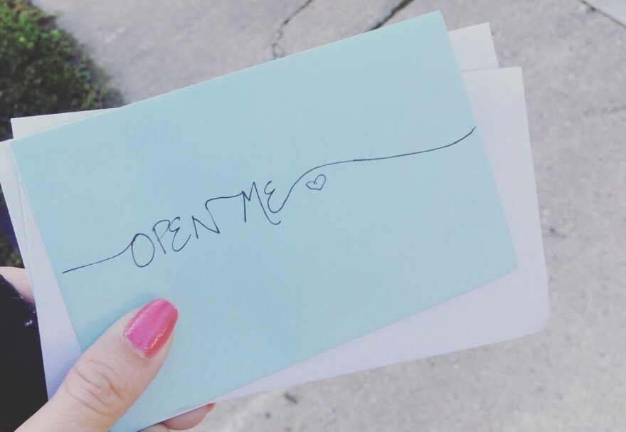 Lord writes "Open me" on her love letter envelopes.