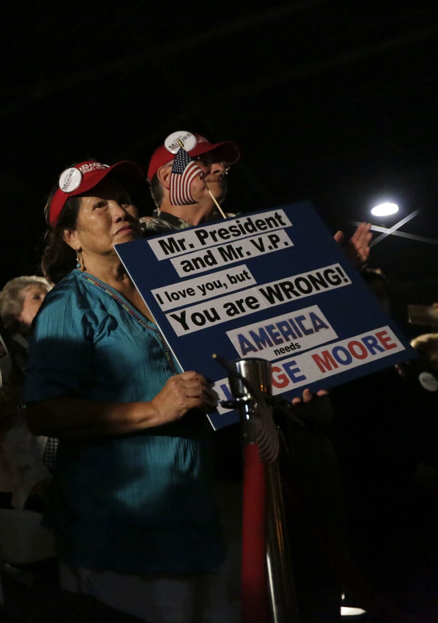 Supporters of Moore attend a rally on Sept. 21 with 2008 vice presidential nominee Sarah Palin.