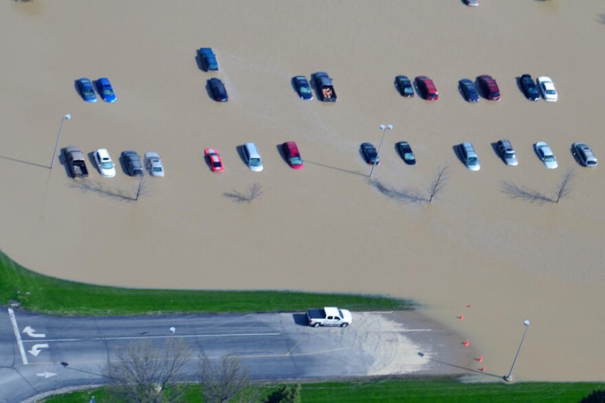 Parked cars in Tipton during the flood of 2013. Tipton was listed in the study as one of the most flood-prone cities in the state.