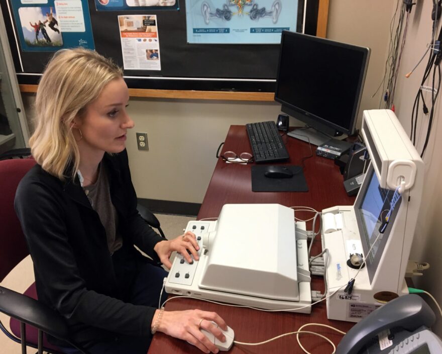 Audiologist Jillian Detwiler reviews a patient’s hearing aid function at the John W. Keys Speech and Hearing Center in Oklahoma City. Detwiler oversees the Cabaret Hearing For Seniors Program, which provides high-quality hearing aids for $100 a pair. 