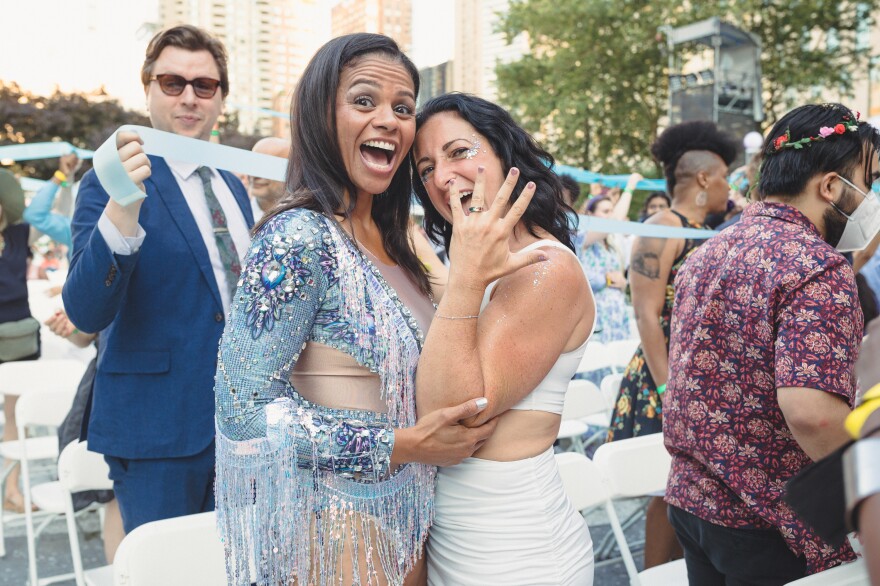 Sheryl Wilson and Jenn Melendez hold up their rings. The two met online via HER App, an app for women who want to date women, 1.5 years ago during the pandemic. They live on the Upper East Side.