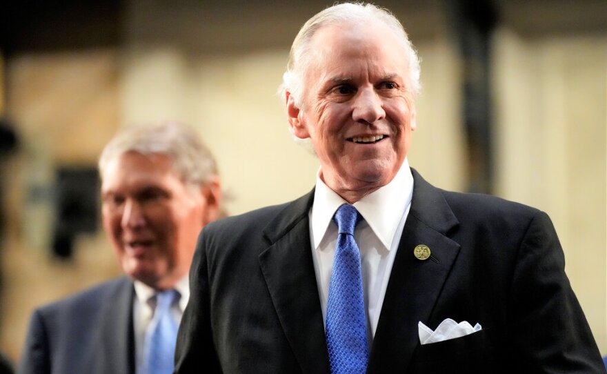 FILE - South Carolina Gov. Henry McMaster greets lawmakers ahead of his State of the State address on Wednesday, Jan. 19, 2022, in Columbia, S.C. Democrats in South Carolina get another shot at loosening the firm grasp Republican have on statewide politics as voting ends Tuesday for the 2022 elections. But it's likely to be a tough fight.(AP Photo/Meg Kinnard, File)