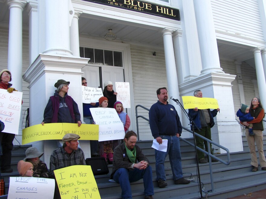 More than 150 people gather to hear farmer Dan Brown speak in 2011. The Maine Department of Agriculture filed suit against Brown, alleging that he was illegally selling unpasteurized milk without a license. Brown, meanwhile, insisted that a local food ordinance adopted by Blue Hill residents protects the rights of farmers to sell directly to consumers without a license.