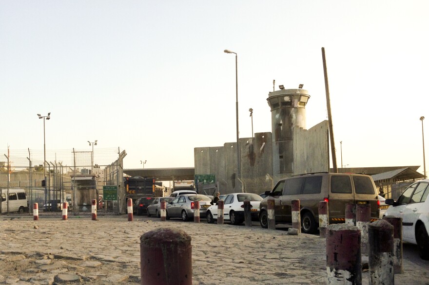Israel built a permanent checkpoint at Qalandia after the second intifada began. It is one of many Israeli checkpoints throughout the West Bank.