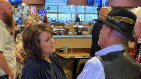 Former state Sen. Sine Kerr, who is running for Arizona lieutenant governor, speaks with an unidentifed voter in Yuma on Monday, Sept. 7, 2026.
