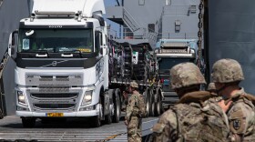 A DoD-contracted driver transports humanitarian aid from the U.S. Army offshore from Gaza. 