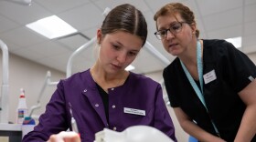 Student Autumn L. receives instruction from dental hygiene instructor Heather Erdmann in the dental lab at Fox Valley Technical College on Oct. 1, 2025.