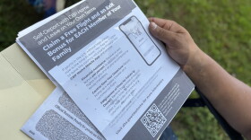 Tito Sabillón holds a flyer he received in the mail from the U.S. Department of Homeland Security encouraging undocumented immigrants to self-deport using an app from Customs and Border Protection.