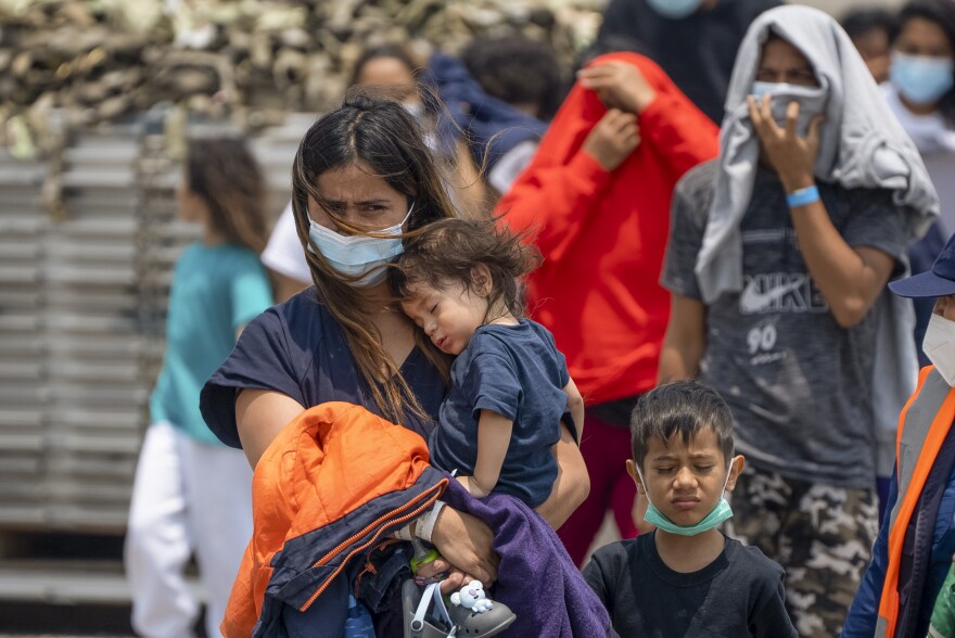 Guatemalan migrants who were deported from the U.S. deplane at La Aurora International Airport in Guatemala City on May 11, 2023. 