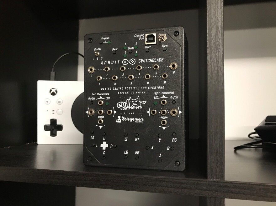 This adaptive controller called the Adroit Switchblade was created by AbleGamers and Evil Controllers. It can be used with an Xbox.