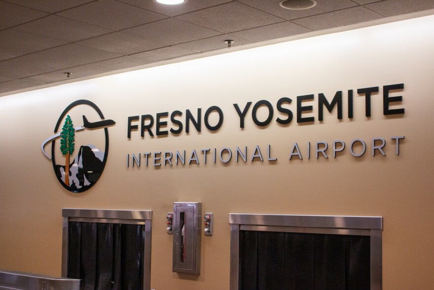 The logo for the Fresno Yosemite International Airport has been switched from this Sequoia tree to a more colorful, watercolor splash.