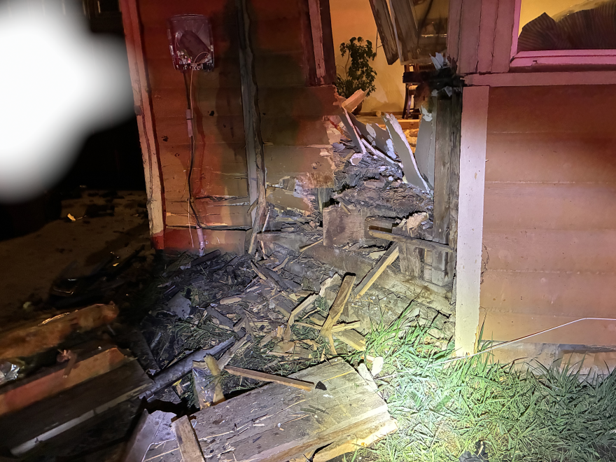 A picture of the side of a Kamas home after a driver crashed into the building.