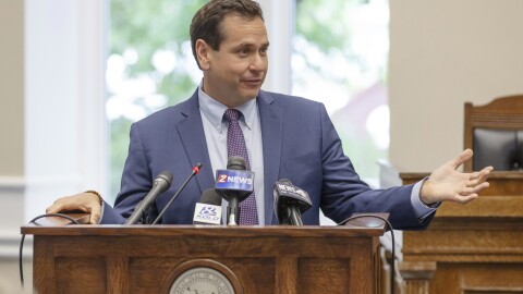 FILE - Nevada Secretary of State Cisco Aguilar speaks before Gov. Joe Lombardo signs an election worker protection bill into law at the old Assembly Chambers in Carson City, Nev., May 30, 2023.