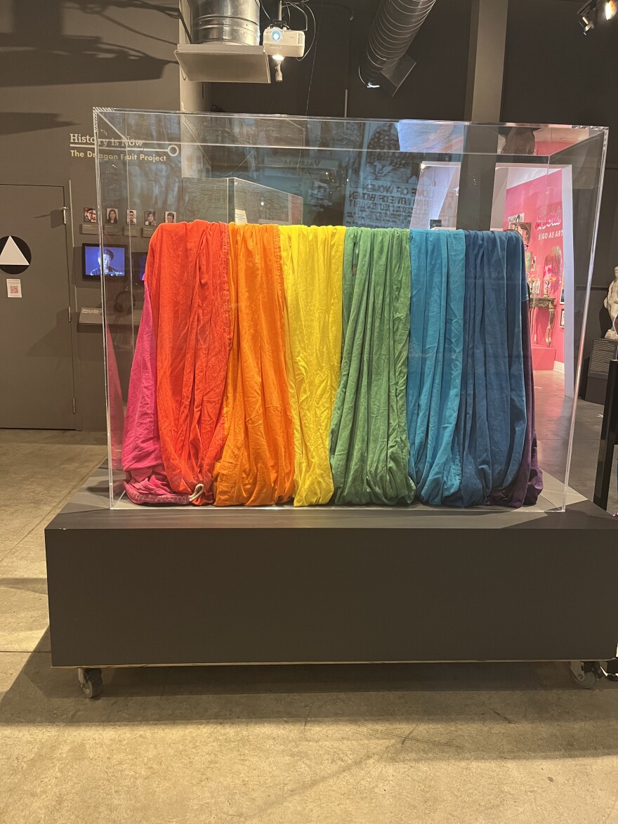 A portion of the original rainbow flag on display at the GLBT museum, which has eight stripes and is made of cotton muslin.