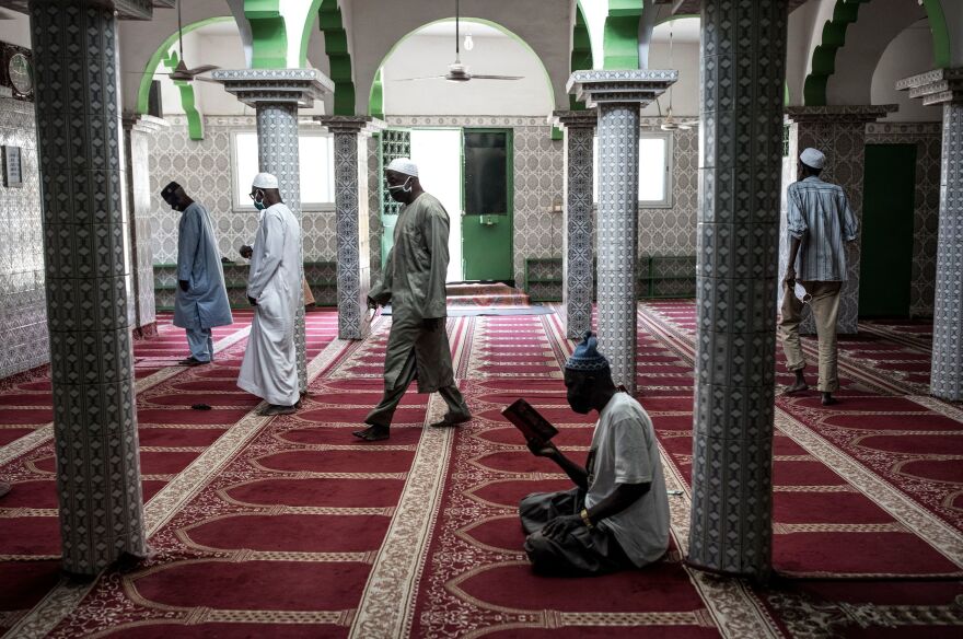 Muslim worshipers practice social distancing after mosques were reopened in Dakar on May 12.